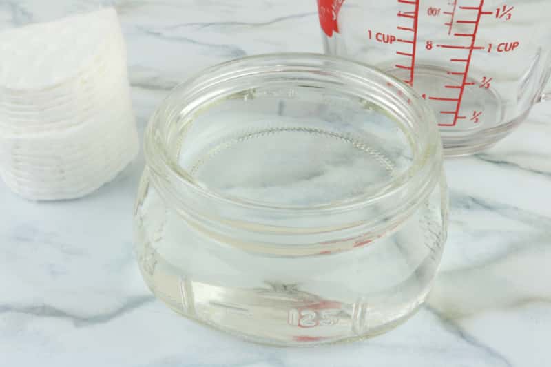 dog ear cleaning solution in a glass jar